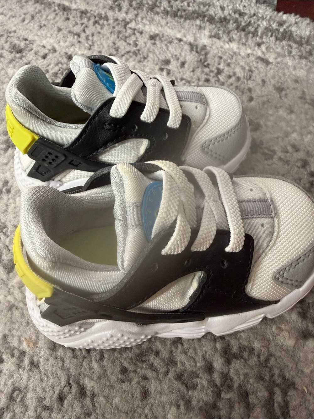Baby Nike White & Black Athletic Sneakers with Yellow Accent